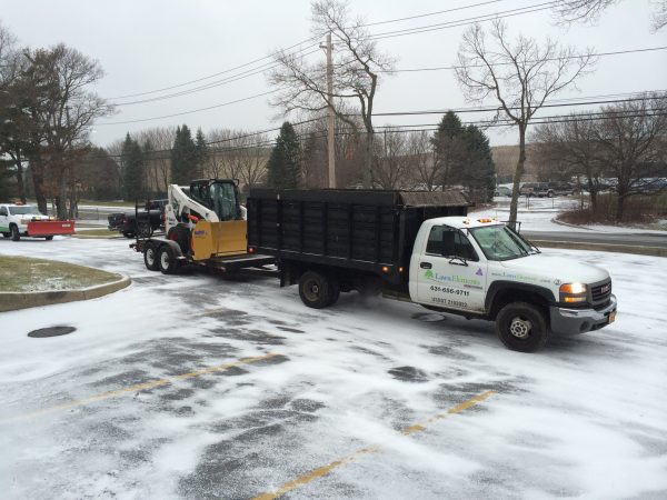 snow removal truck and tractor